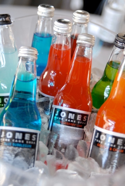 Colorful Jones sodas in clear ice buckerts served as the table centerpieces
