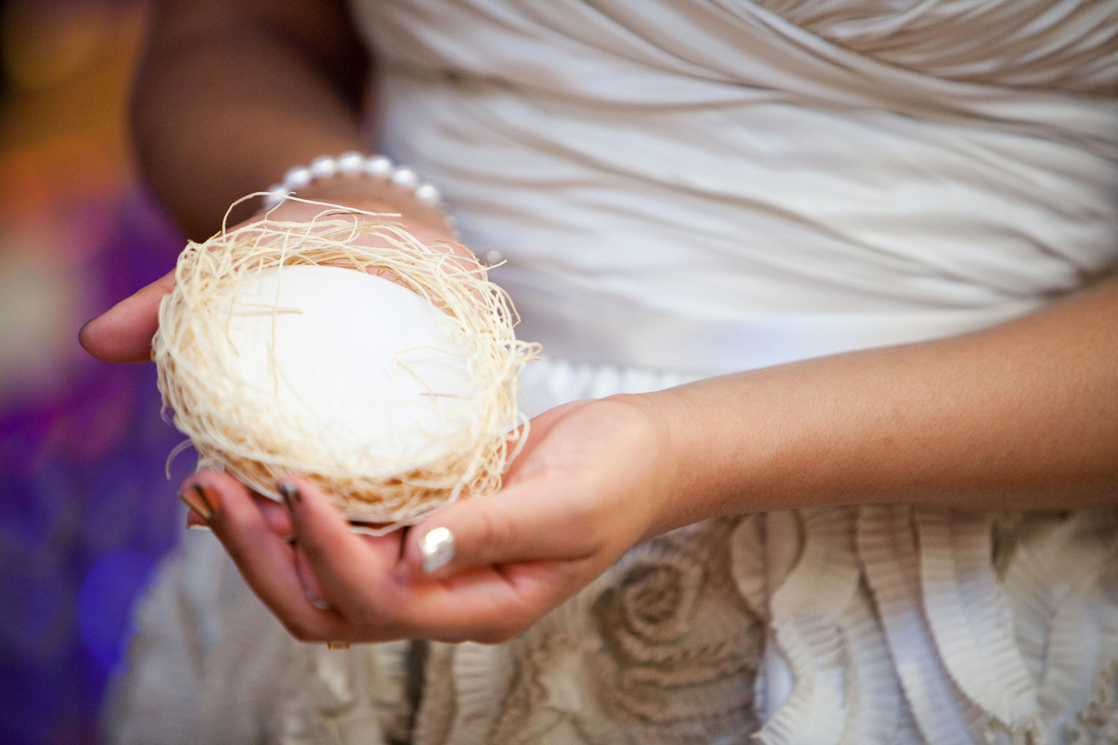 the bride holds the ring bearer bowl by Paloma's Nest