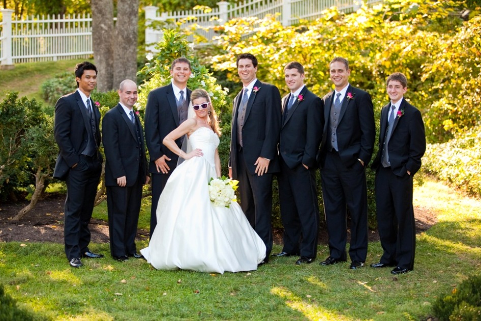 sassy bride with groomsmen