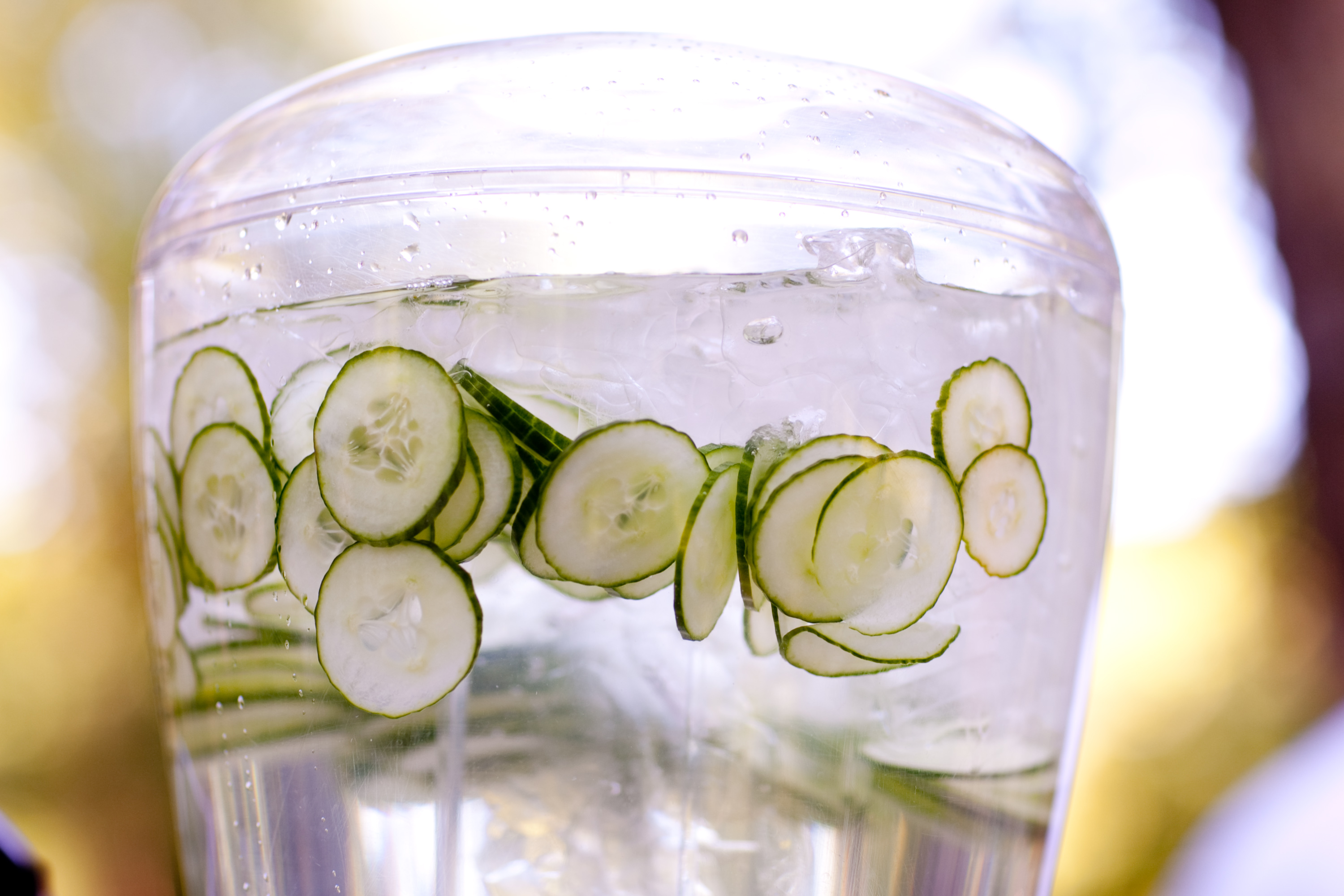 cucumber water in an apothecary jar