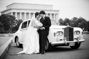 bride and groom with vintage rolls royce, lincoln memorial in the background