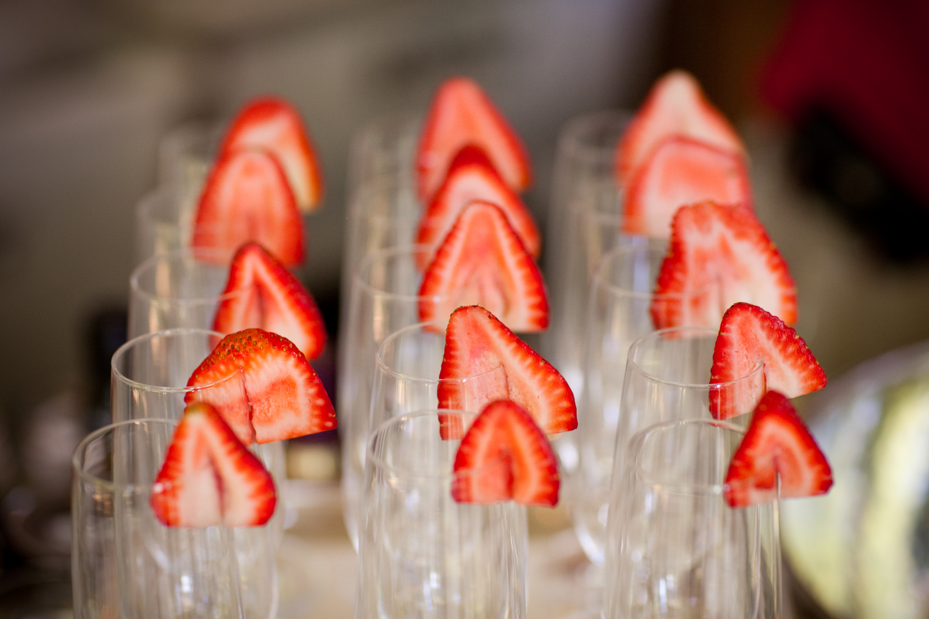 champagne flutes with strawberry garnish