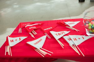 handmade gray and red pennant flags for the guests