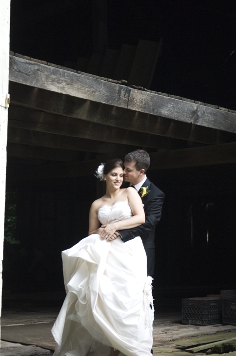 bride and groom portrait in an old barn