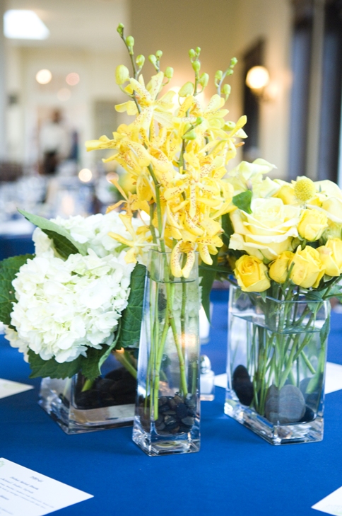 Yellow and white flowers on a navy linen