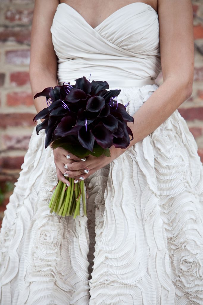 bridal bouquet of eggplant calla lilies