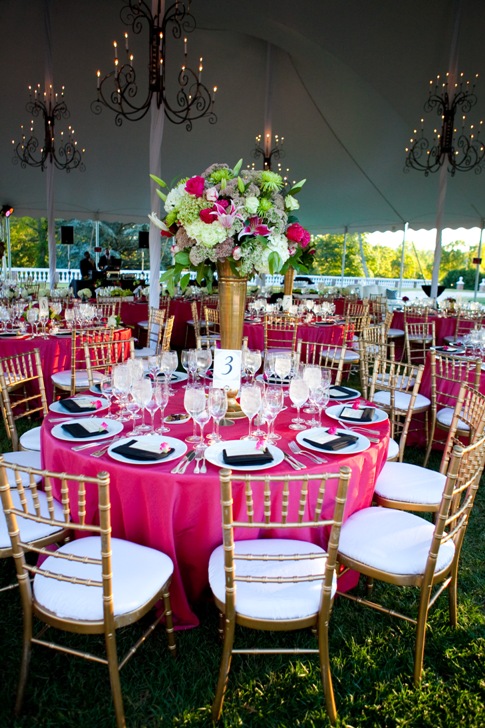 gold chairs, pink linens, tall floral centerpiece
