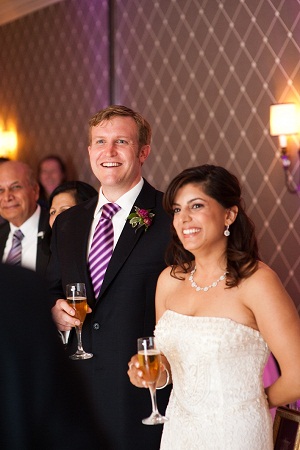 bride and groom enjoy the toasts in their honor