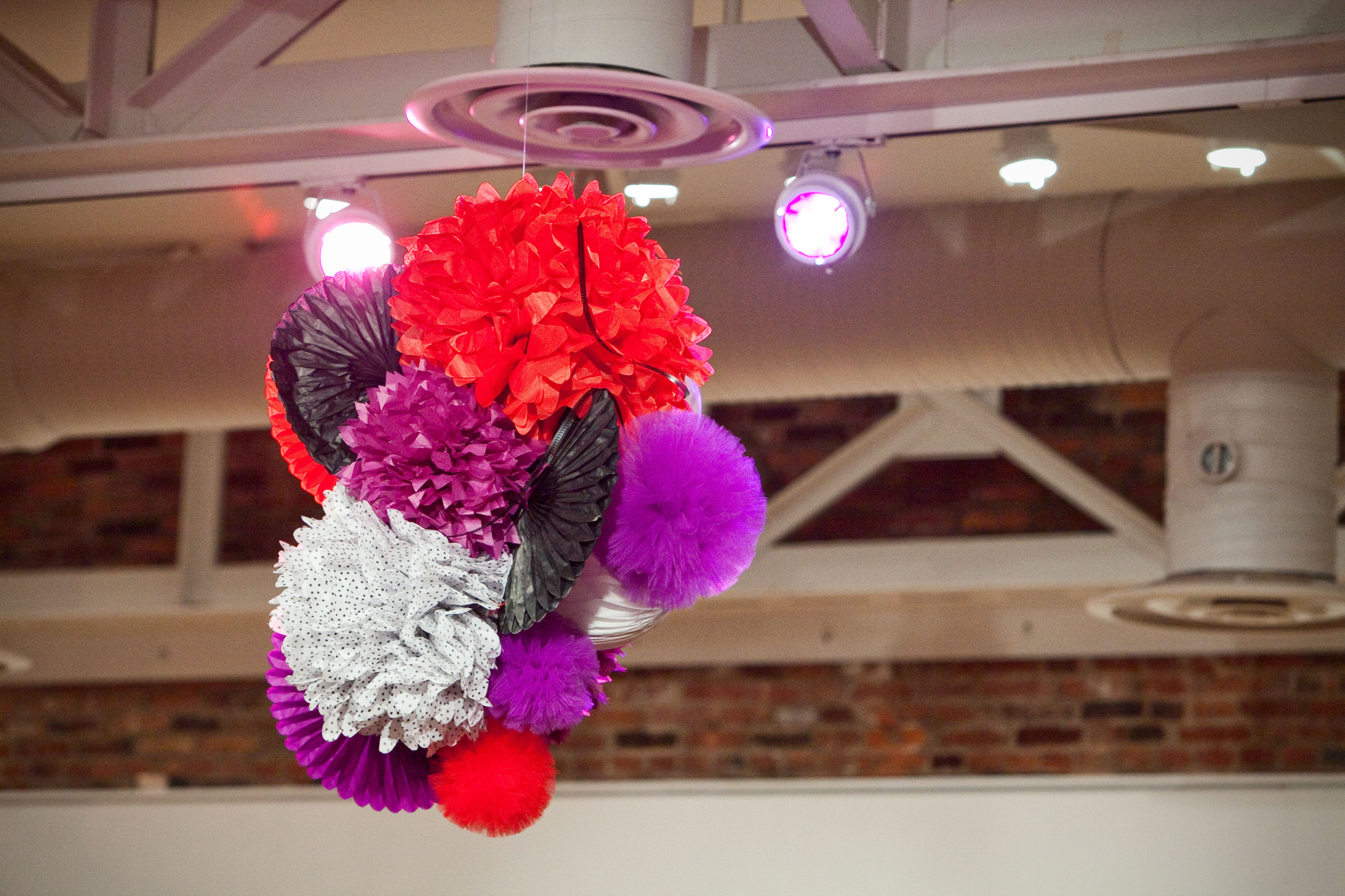 purple, red, black and white paper pom chandelier
