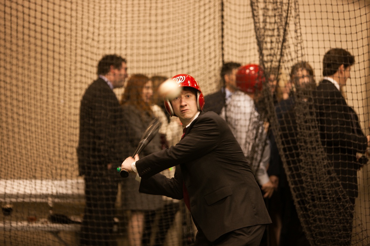 the groom takes batting practice