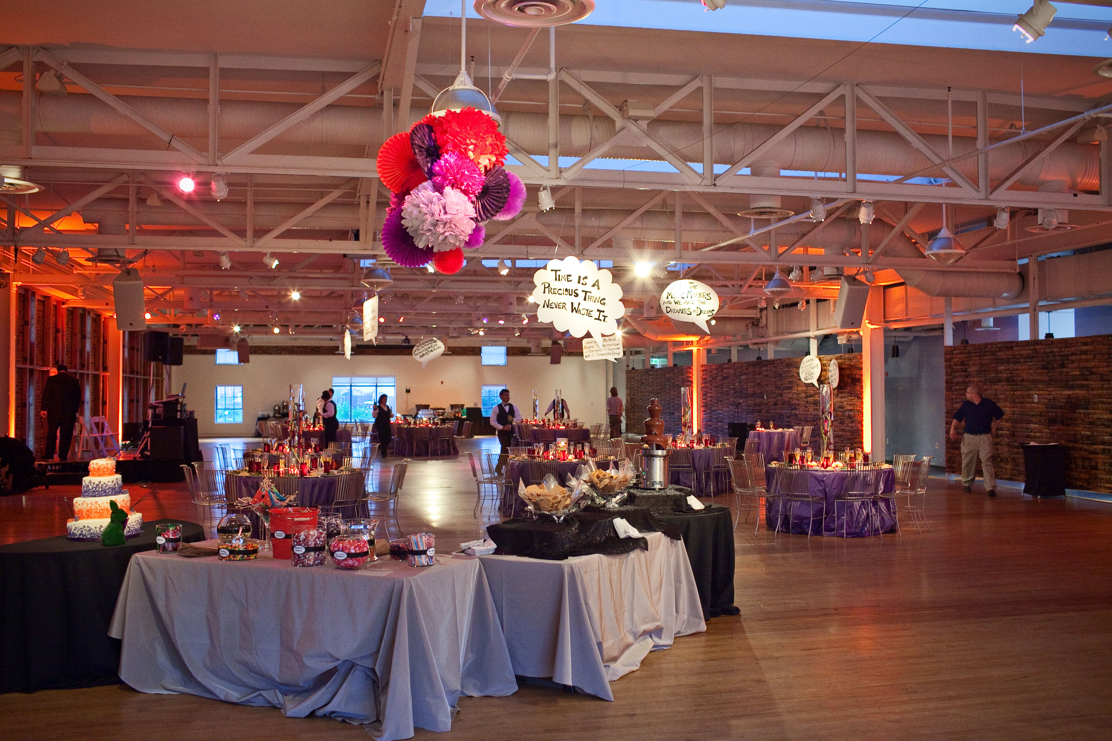 wide shot of the candy buffet with paper chandelier overhead