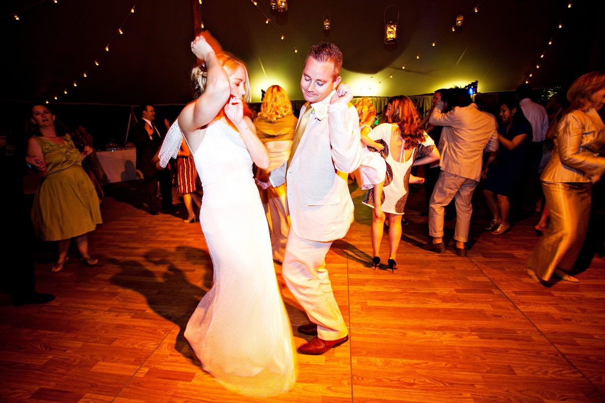 the bride and groom dance
