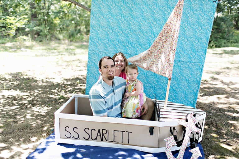 13  Tim Riddick Photography Lemonade Design Studio Bellwether Events Row Row Row Your Boat Nautical pastel rainbow first birthday party cardboard boat photo booth