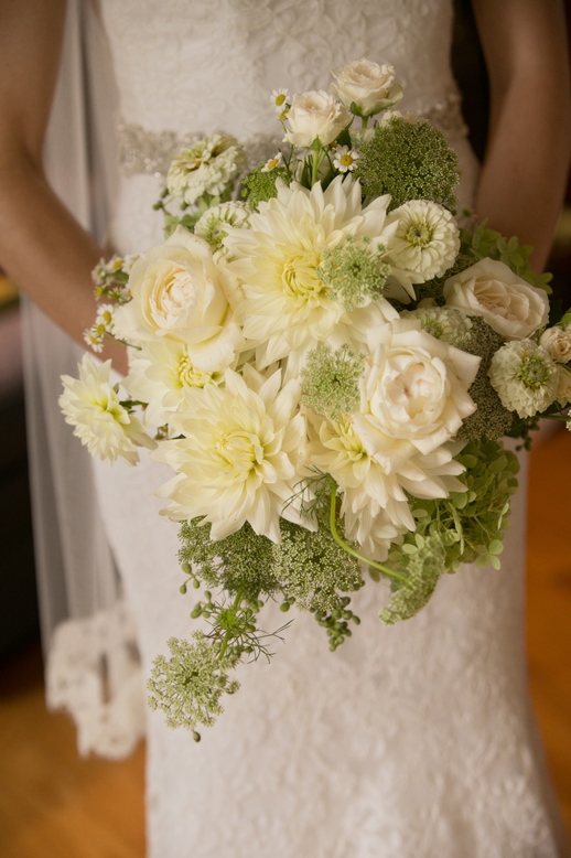 a white and green bridal bouquet