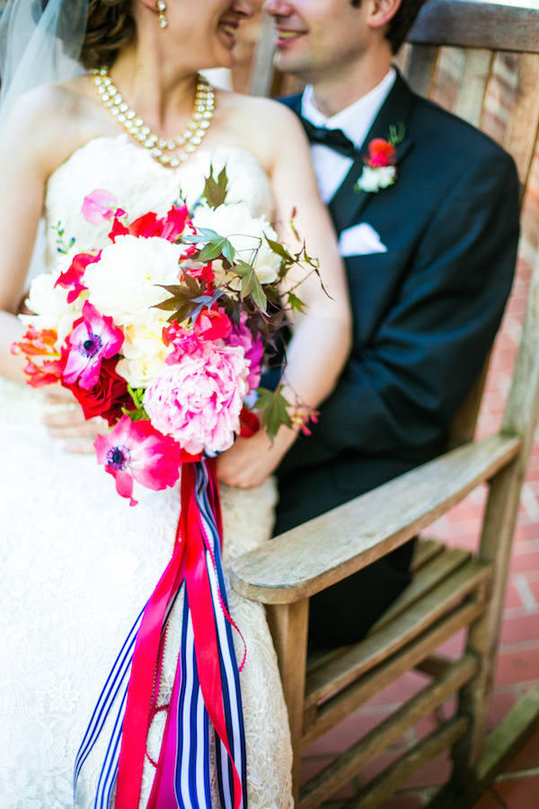 Pink, white and navy palette for this bridal bouquet with trailing ribbons