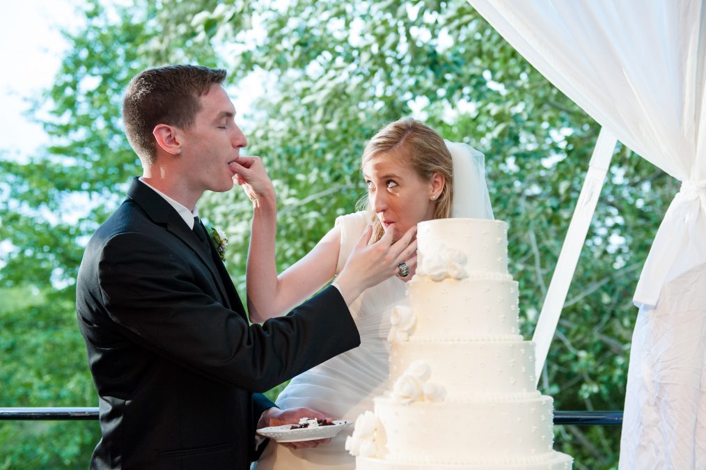 Cake cutting at a Virginia at-home wedding