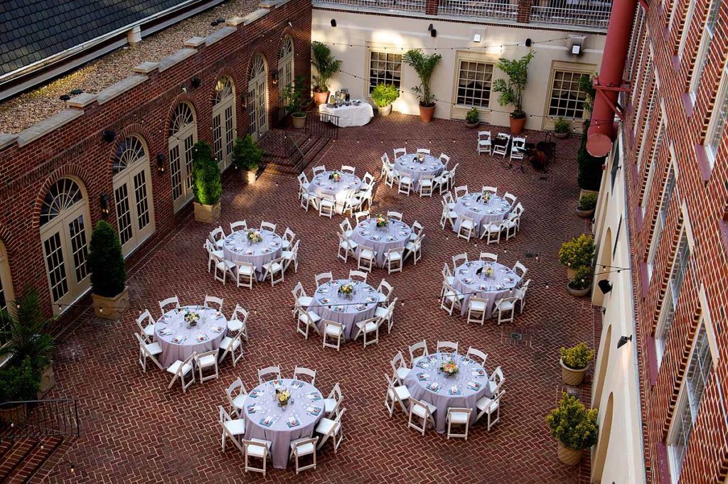 The Alexandrian Hotel wedding reception Alexandria Virginia in the Courtyard al fresco - table sizes advice - how many guests fit at a wedding table - 