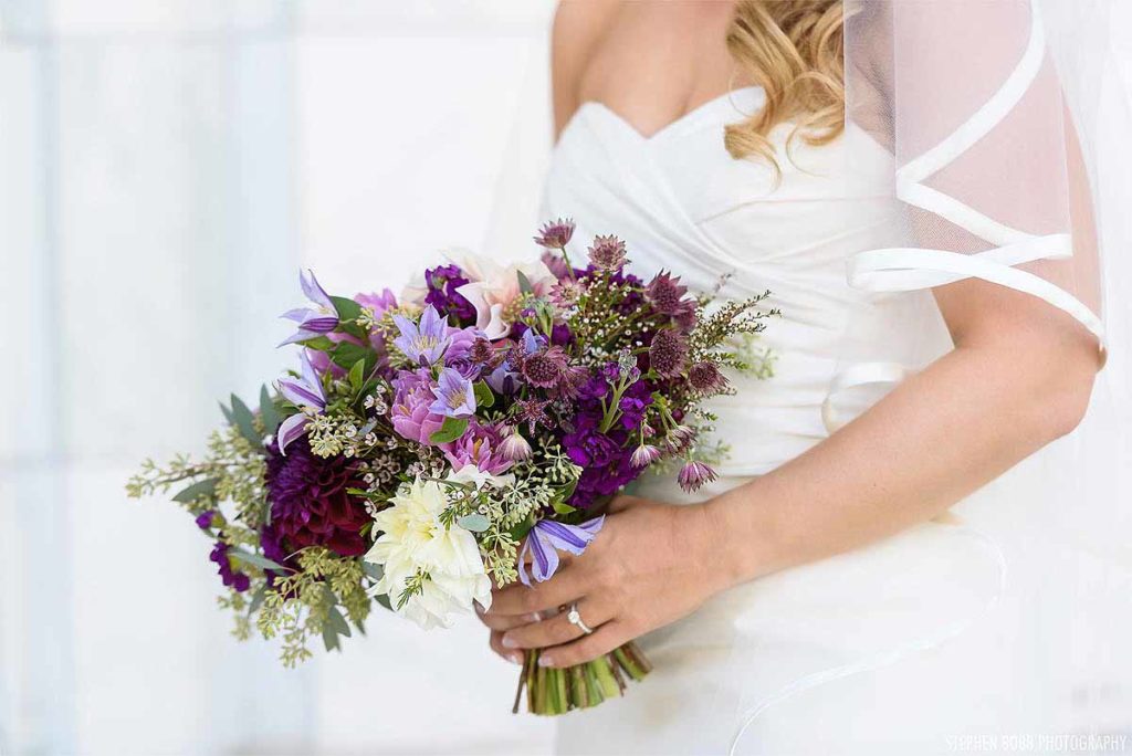 A textural, purple bridal bouquet