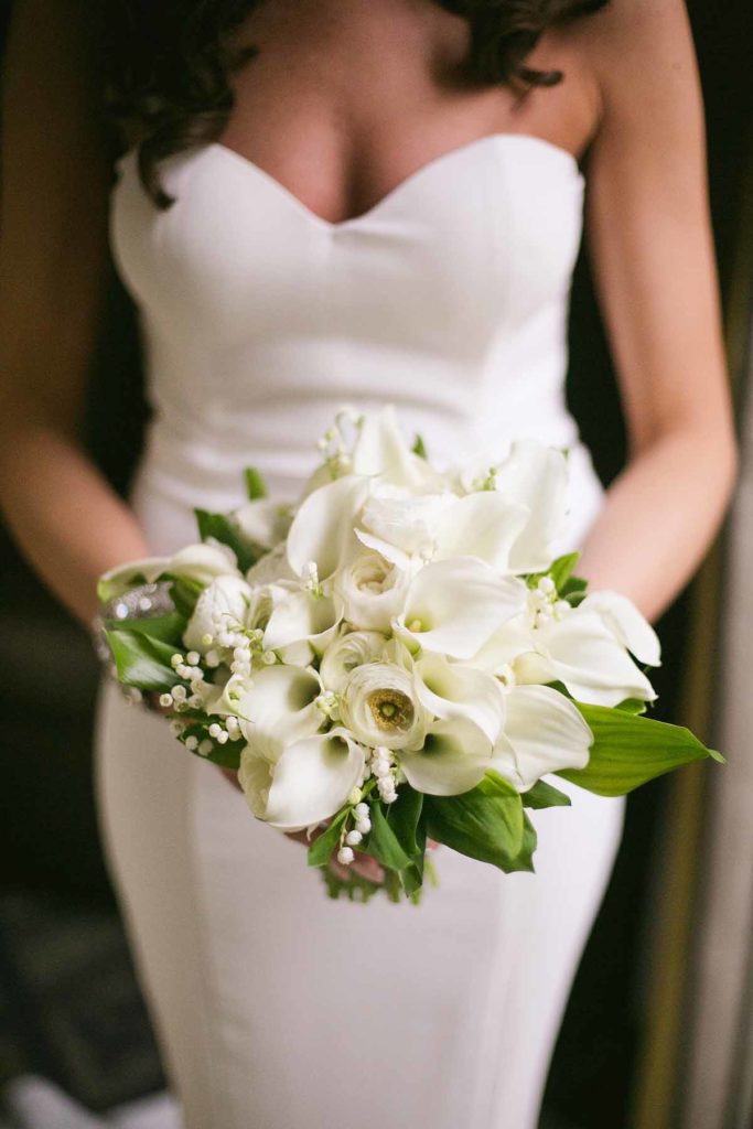AN all white bridal bouquet
