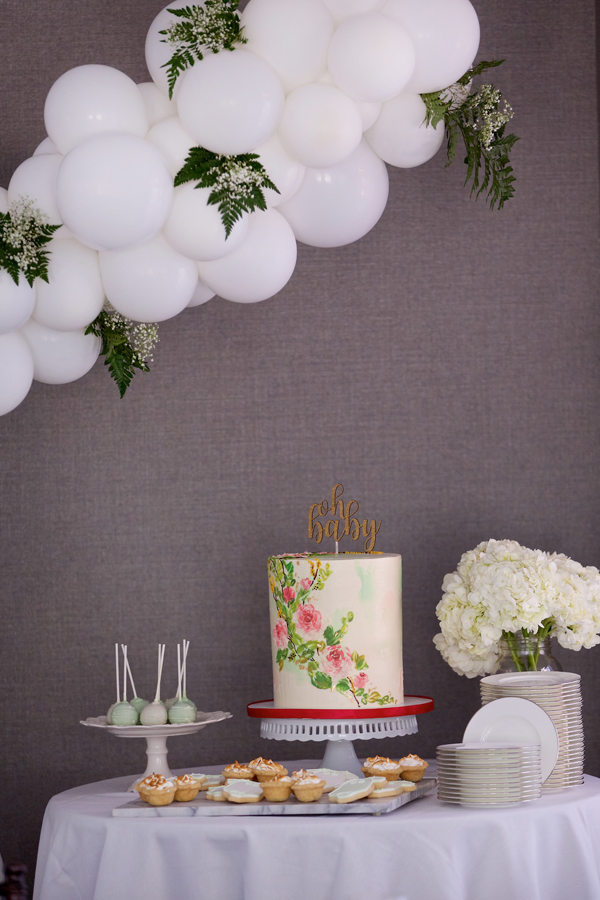 A classy, neutral baby shower in Alexandria VA - balloon arch cake table