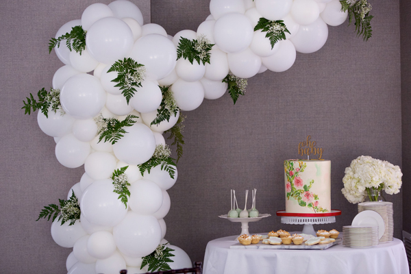 A classy, neutral baby shower in Alexandria VA - balloon arch cake table