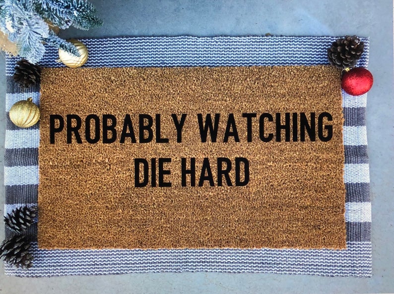 pop culture gifts for dad: die hard welcome mat