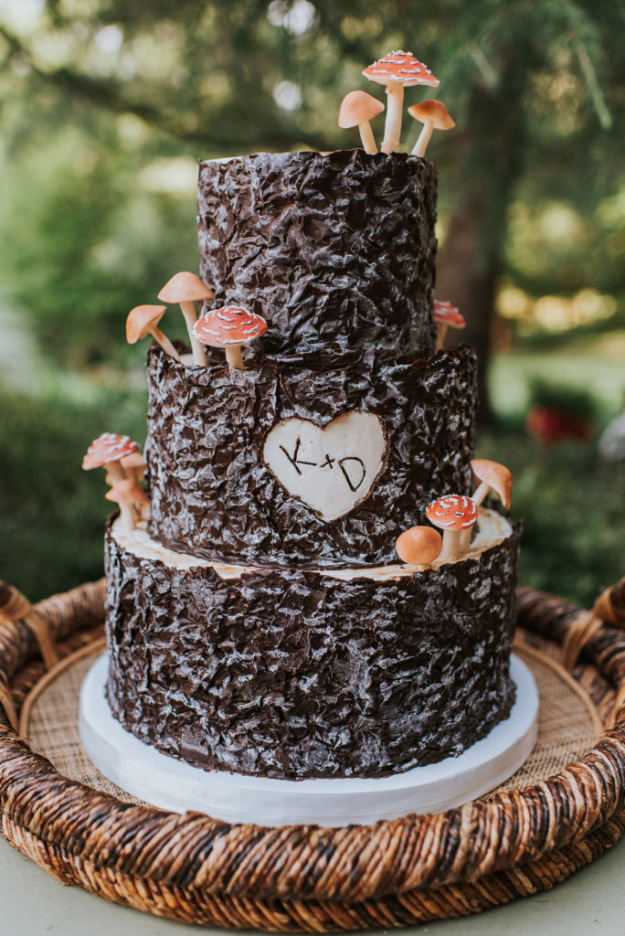 Woodland Fantasy tree trunk wedding cake with mushrooms