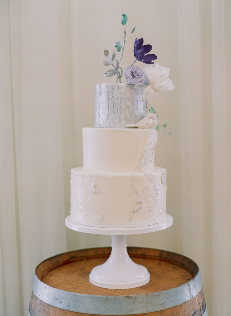 Stunning white, silver and lavender wedding cake
