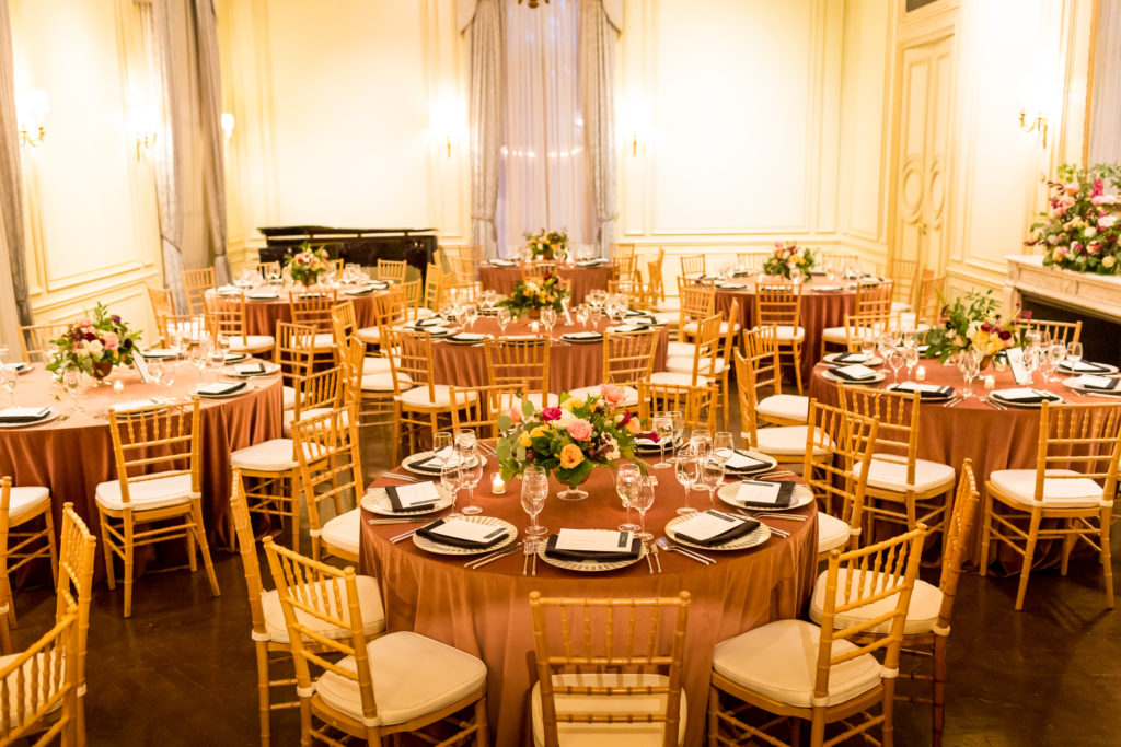 Meridian House DC wedding reception with round tables with dusty rose velvet linens and gold chairs. planned by Bellwether Events.