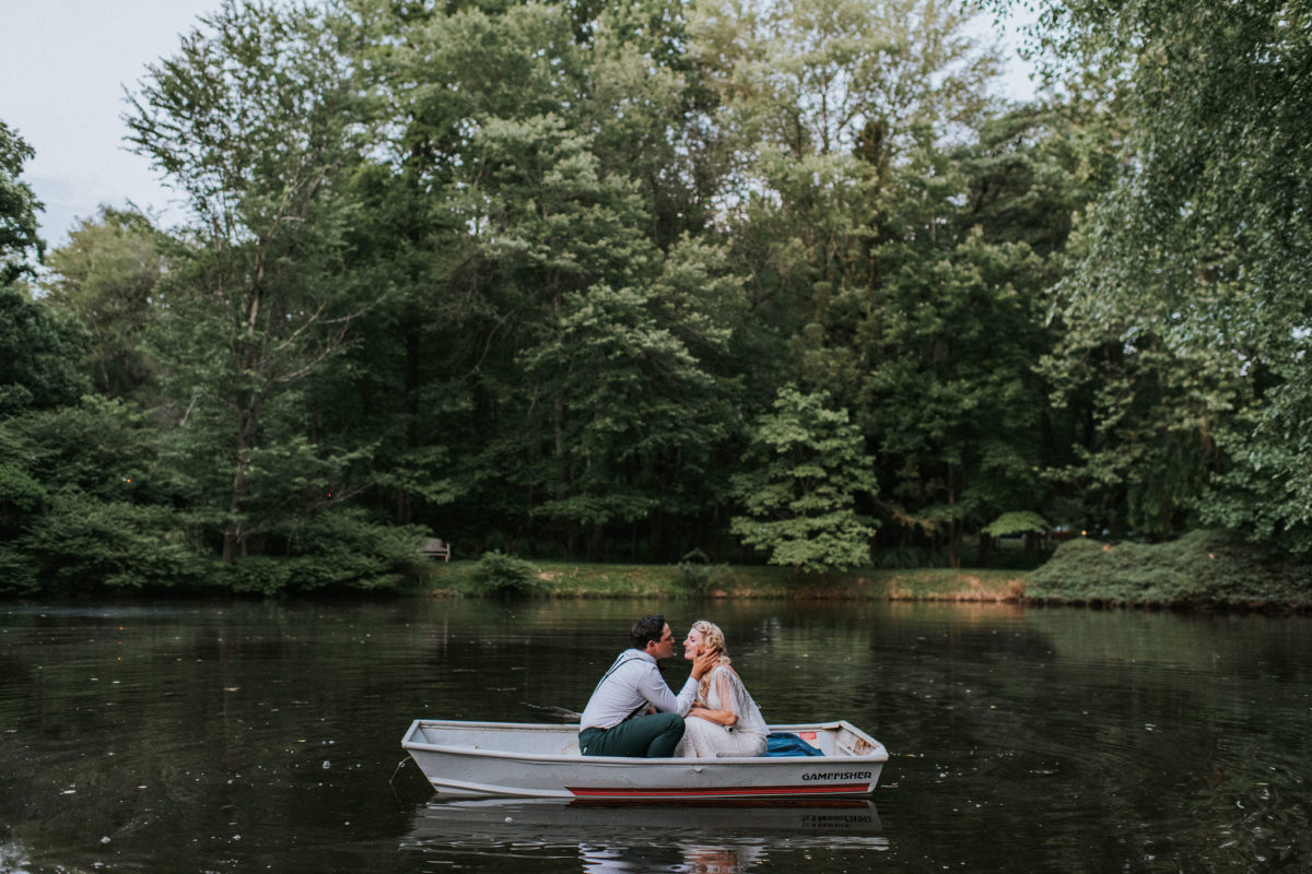 Virginia home wedding photo pond boat couple