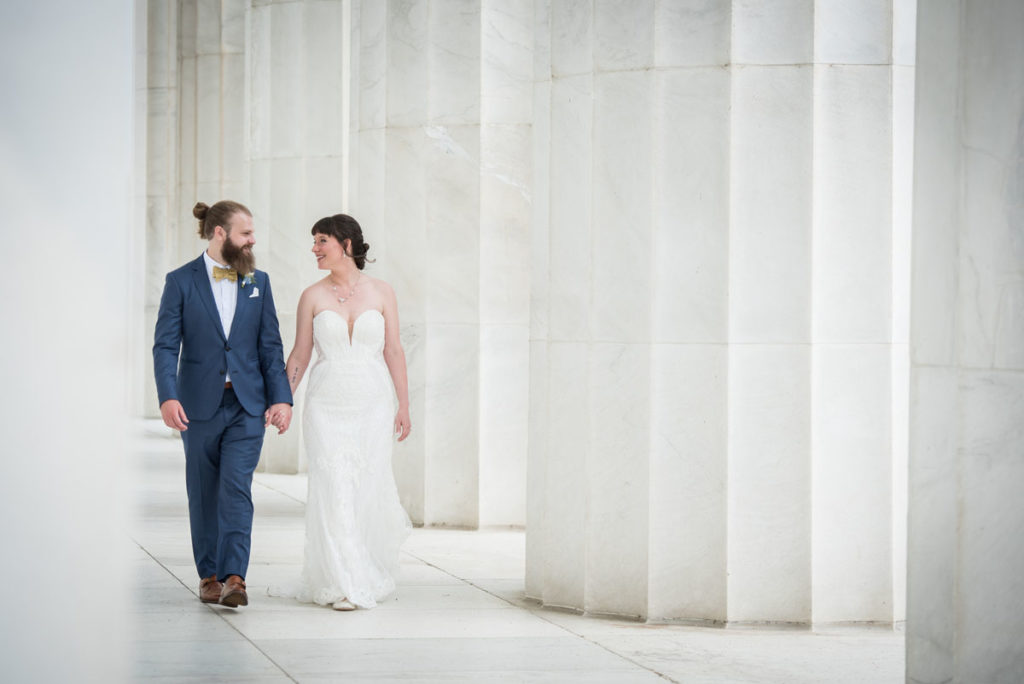 DC micro wedding - couple walking at the Lincoln Memorial