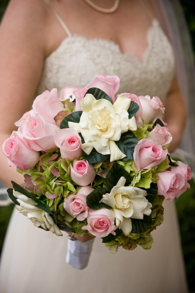pink and green bridal bouquet with magnolias