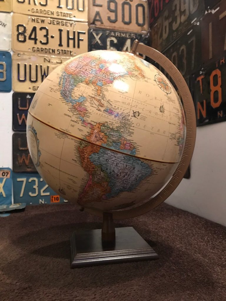 a vintage globe for your zoom room decor