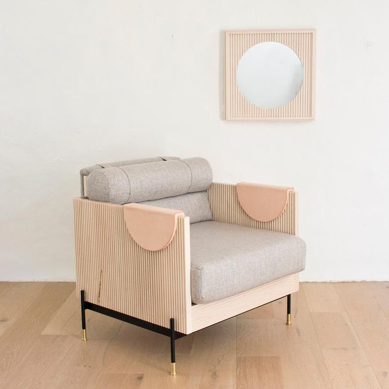 big gifts for the home - modern club chair made of leather, brass and wood