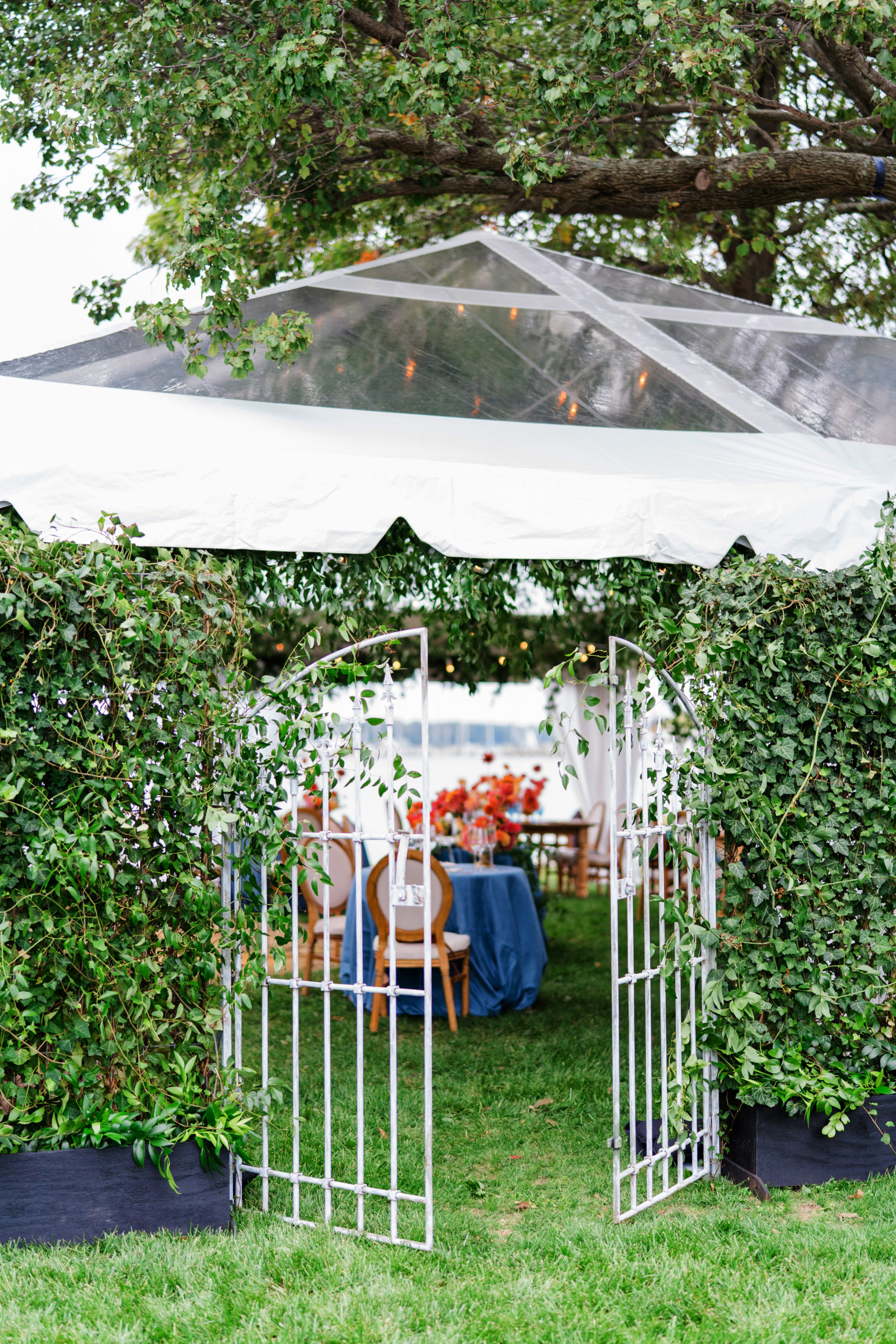 secret garden gate wedding tent - Waterfront Wedding Southern Maryland Bellwether Events Kurstin Roe Photography Sugarplum Tent Co