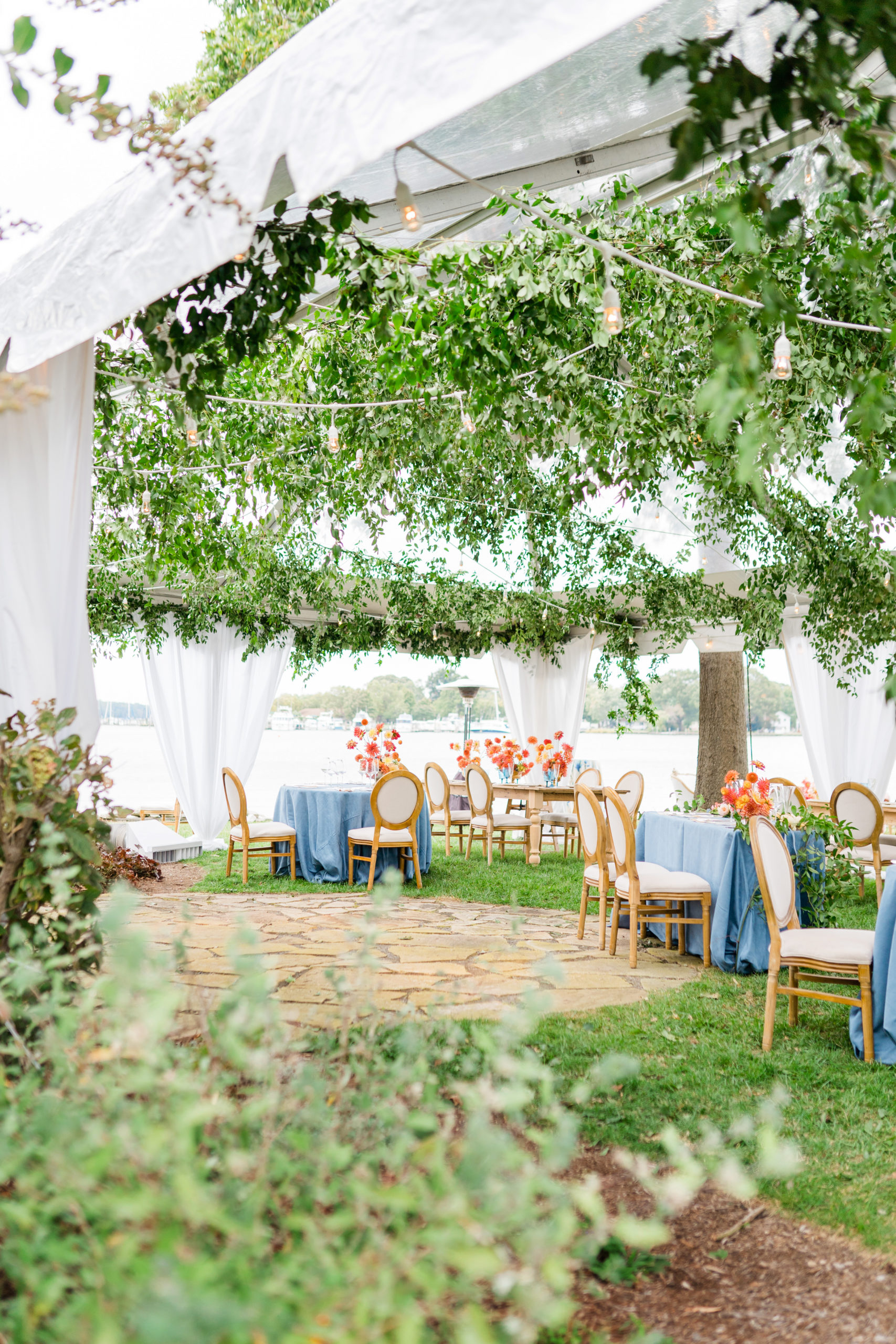 Secret garden wedding tent blue and coral - Waterfront Wedding Southern Maryland Bellwether Events Kurstin Roe Photography Sugarplum Tent Co