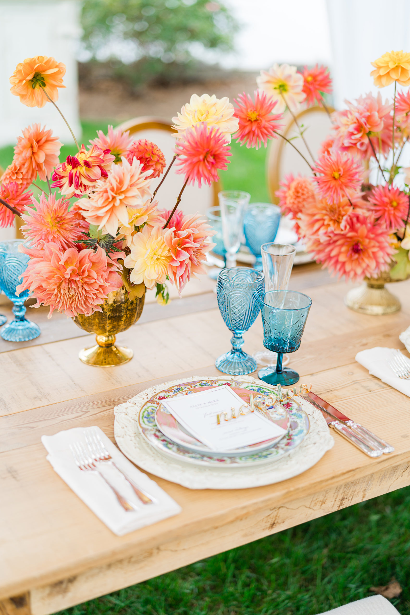 colorful coral flowers, blue glassware and vintage china - Waterfront Wedding Southern Maryland Bellwether Events Kurstin Roe Photography Sugarplum Tent Co