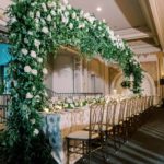 NMWA DC Museum wedding reception head table massive greenery arch