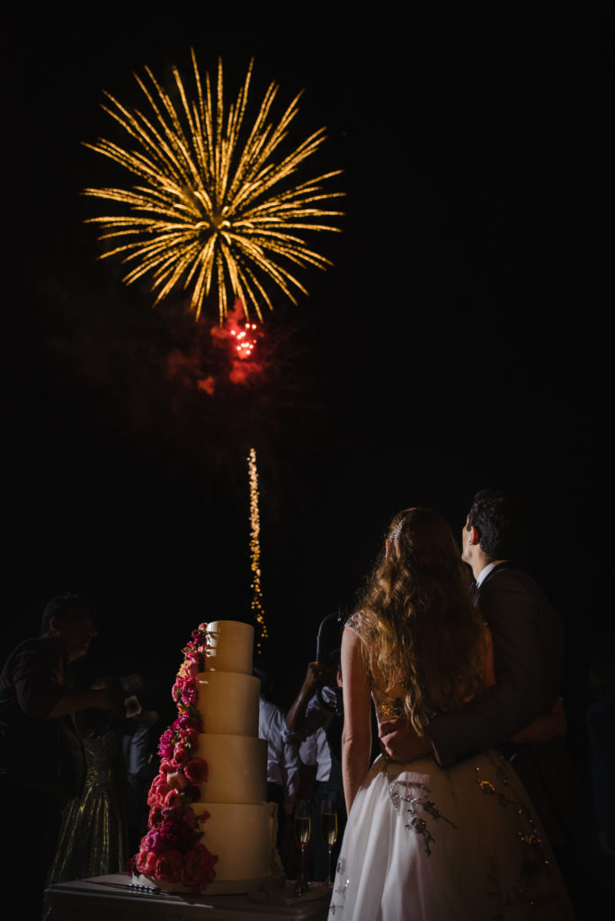 white wedding cake with fireworks