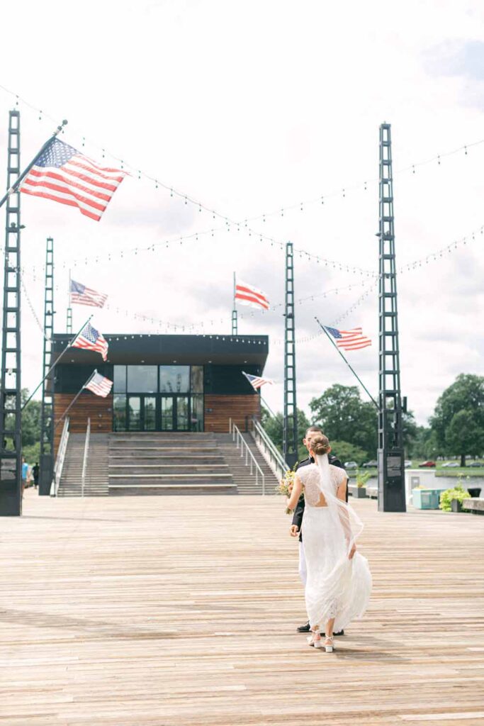 Military groom awaits at The Wharf in Washington DC for his bride to arrive for the first look