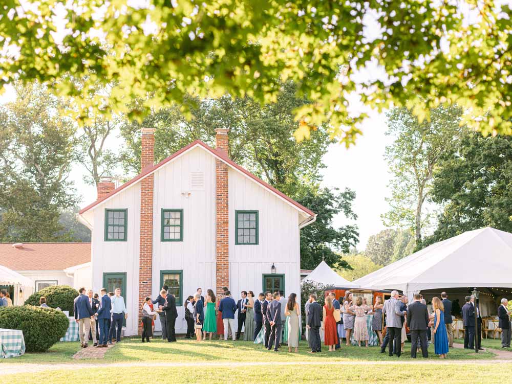 Maryland Tented wedding reception - summery florals - Marlborough Hunt Club 