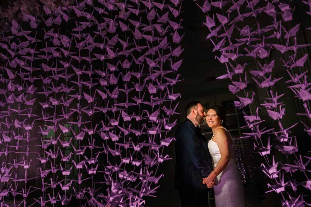 Colorful Spring DAR wedding - origami crane bride and groom portrait