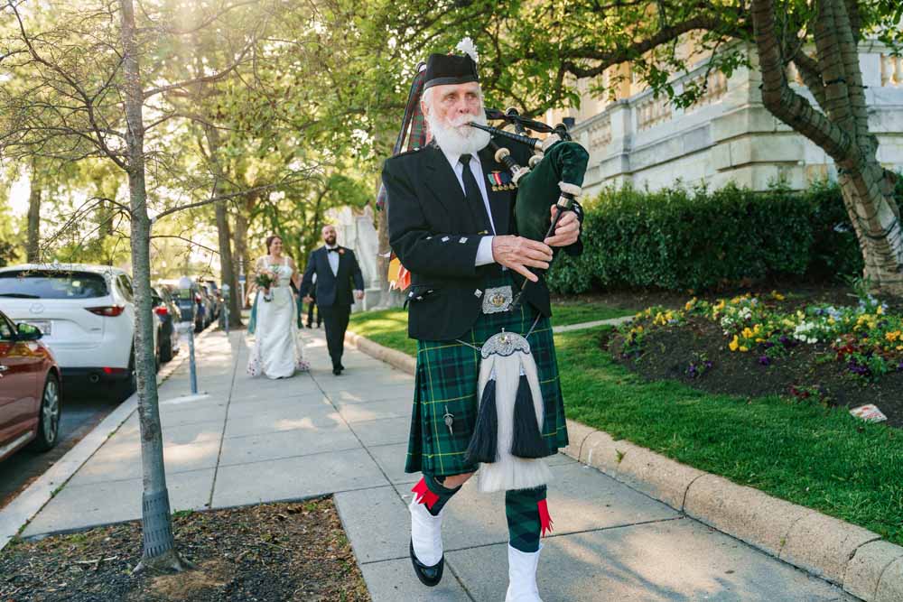 bagpiper at Colorful Spring DAR wedding ceremony