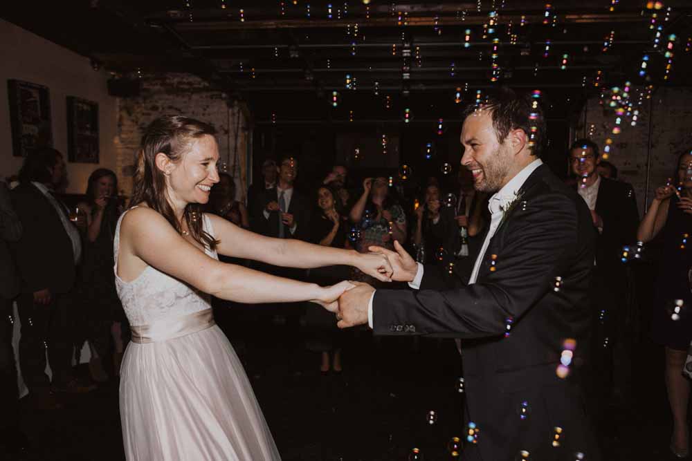 DC Art Gallery Wedding - bride and groom final dance bubbles