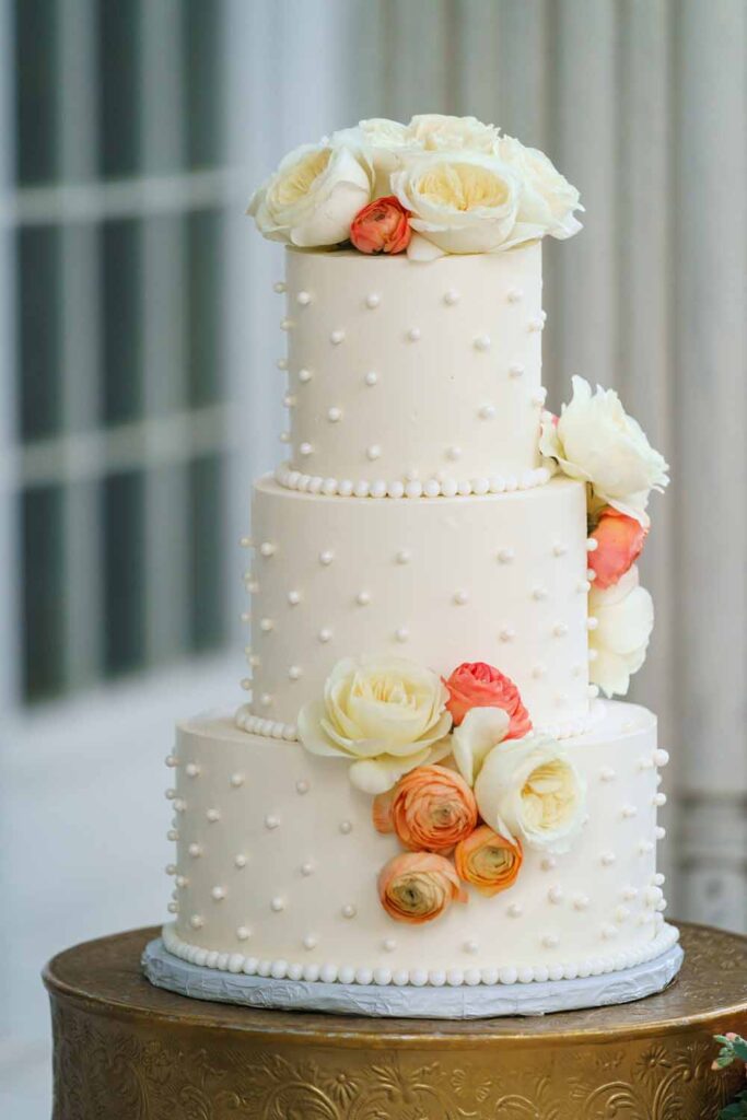 White swiss dot wedding cake Colorful Spring DAR wedding