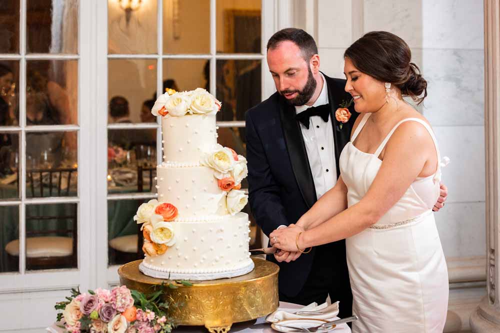 Cake cutting on the portico - Colorful Spring DAR wedding