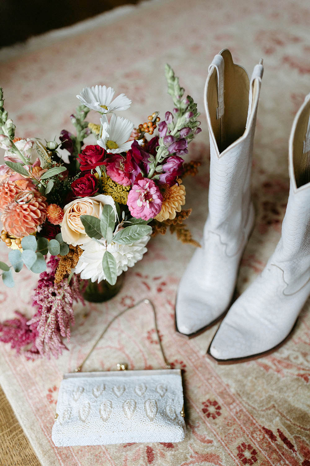 White bridal cowboy boots at a Bellwether Events wedding - Lexi Truesdale Photography