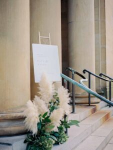 welcome sign at the Line - autumn rooftop wedding - pampas grass