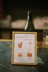 signature cocktail drinks sign at the Line - autumn rooftop wedding