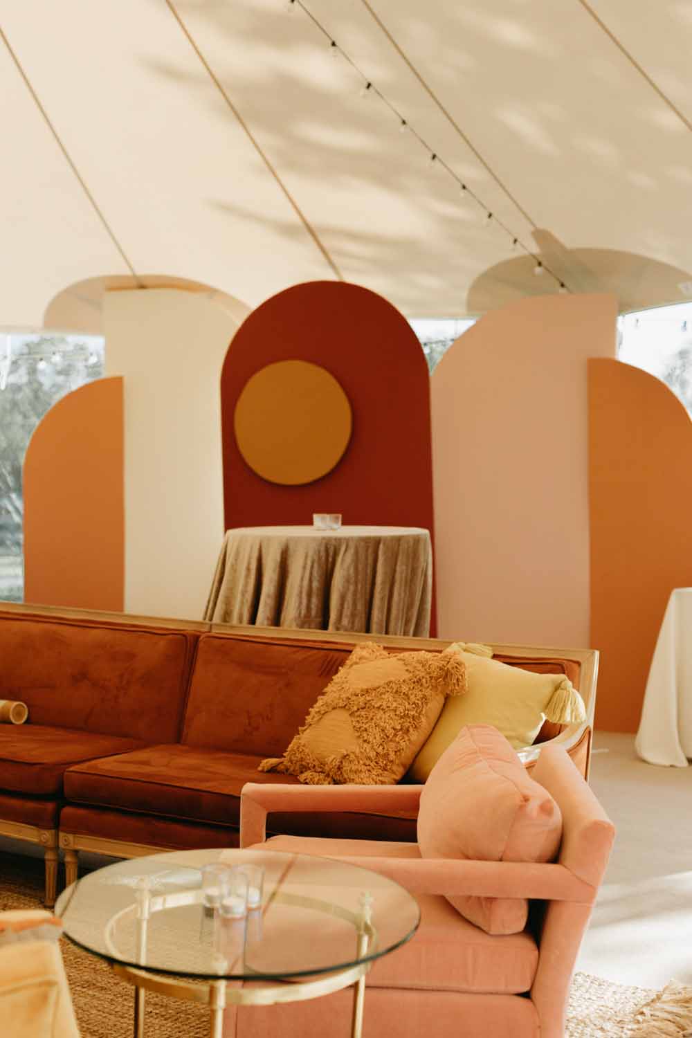 terracotta blush marigold lounge and back drop and slatted wood bar Boho Tented Wedding at Maryland Private Home